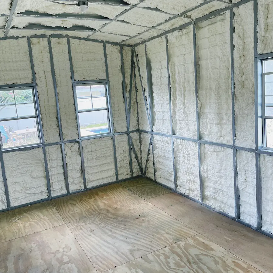Closed-cell spray foam insulation applied to wall cavities in a residential project in Camano